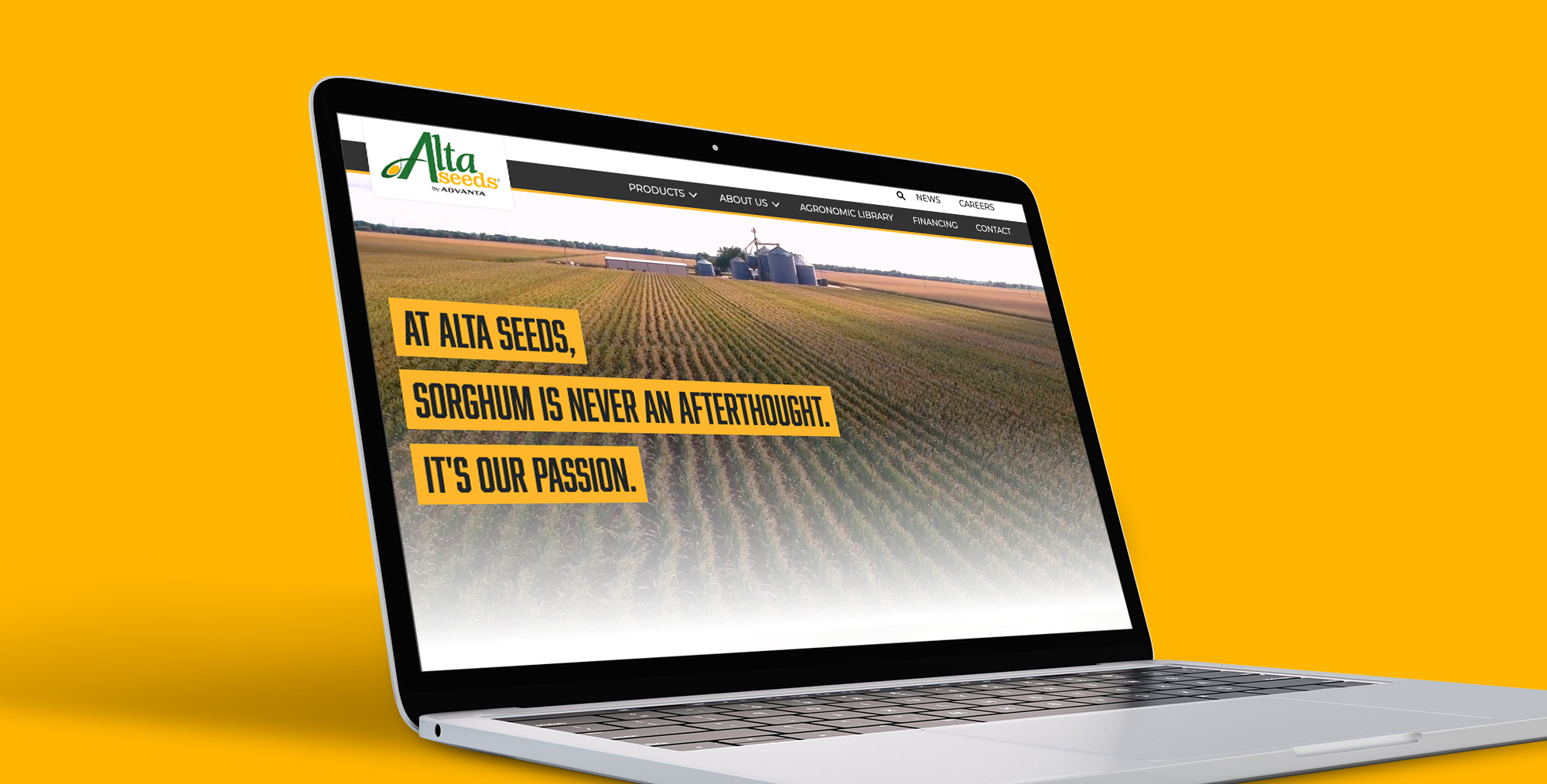 A digital image of a laptop with the Alta Seeds homepage showing on the laptop screen. 